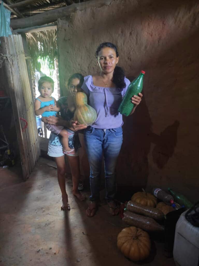 Maria das Graças with the family's native seeds. Photo: Raniere Roseira, CPT agent, Maranhão Region